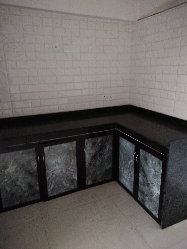 Kitchen, mutha-sai-nirvana 2 Bedroom 1085 Sq.Ft. Apartment In Shahad Thane 9337207