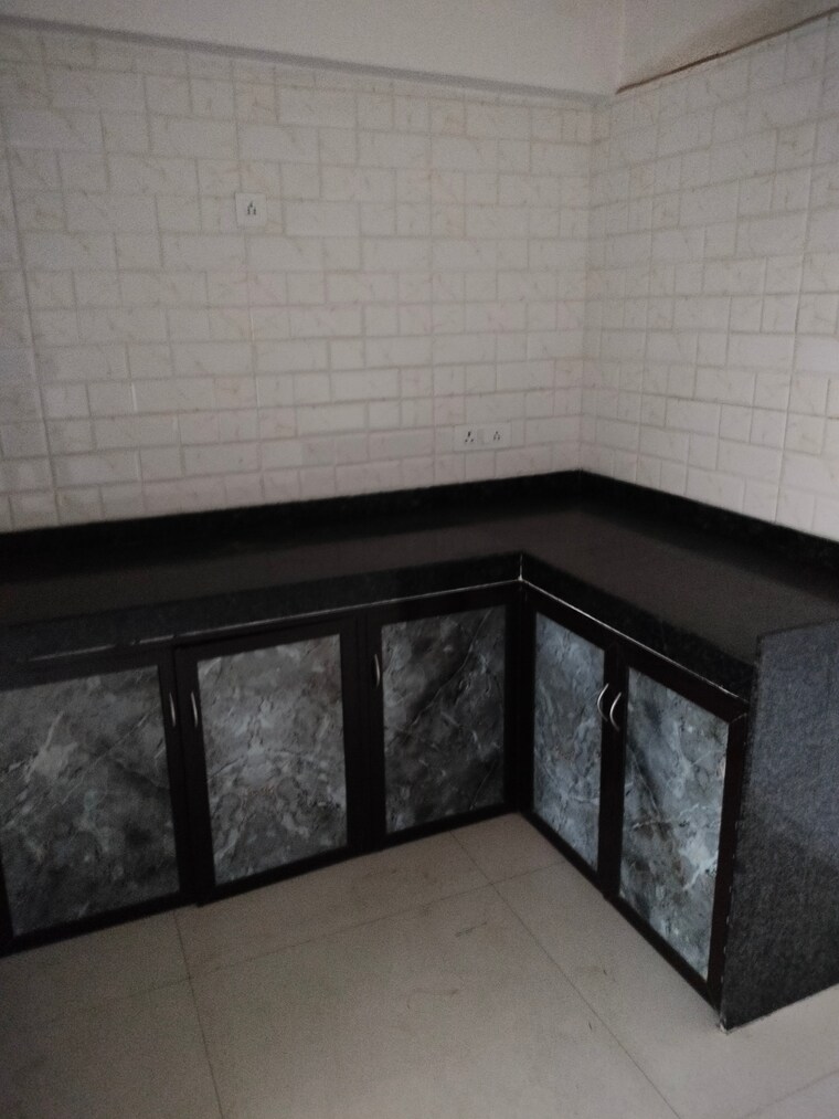 Kitchen, mutha-sai-nirvana 2 Bedroom 1085 Sq.Ft. Apartment In Shahad Thane 9337207