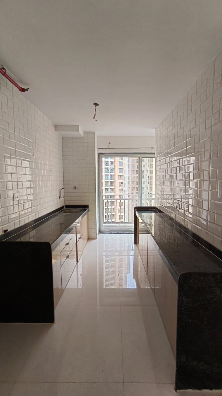 Kitchen, mutha-sai-nirvana 2 Bedroom 1085 Sq.Ft. Apartment In Shahad Thane 9337281