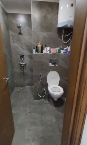Bathroom in 3 BHK Builder Floor at Dwarika Raj Garden City, Raj Nagar Extension – for Sale