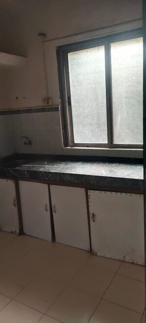 Kitchen in 1 RK Apartment at Ram Rahim CHS Vasai, Vasai East – for Sale