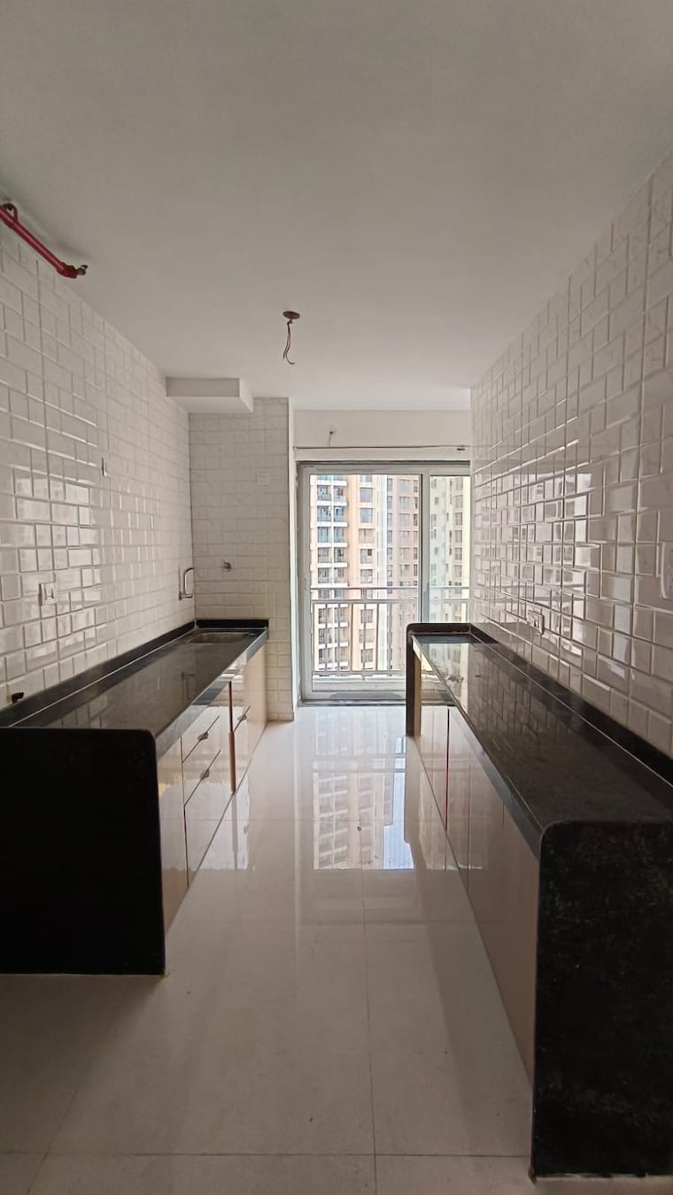 Kitchen, mutha-sai-nirvana 2 Bedroom 1085 Sq.Ft. Apartment In Shahad Thane 9337477