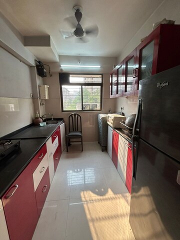 Kitchen in 1 BHK Apartment at Soham Parijat Gardens, Ghodbunder Road – for Rent
