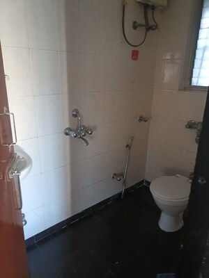 Bathroom in 2 BHK Apartment at Lalani Velentine Apartment 1 Wing D, Malad East – for Rent