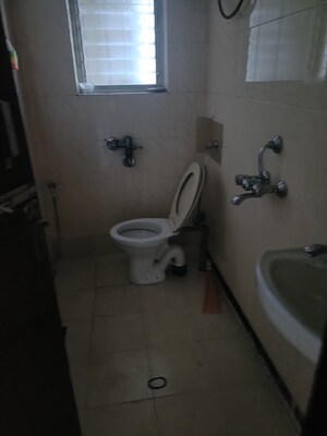 Bathroom in 2 BHK Apartment at Lalani Velentine Apartment 1 Wing D, Malad East – for Rent