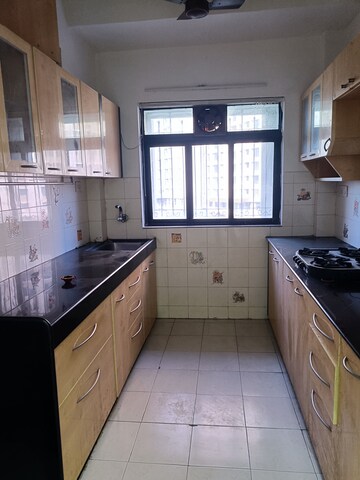 Kitchen in 2 BHK Apartment at Lalani Velentine IV And V, Goregaon East – for Rent