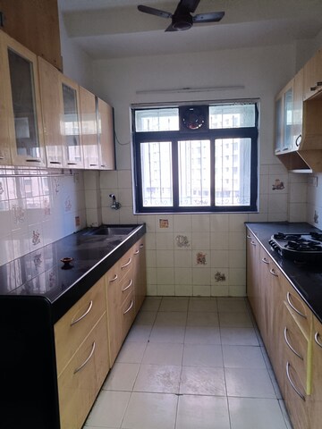 Kitchen in 2 BHK Apartment at Lalani Velentine IV And V, Goregaon East – for Rent