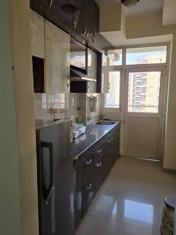 Kitchen in 1.5 BHK Apartment at KW Srishti, Raj Nagar Extension – for Rent