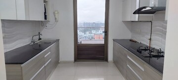 Kitchen in 4 BHK Apartment at Raja Pittie Kourtyard, Kharadi – for Rent