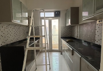 Kitchen in 1 BHK Apartment at Omkar Alta Monte, Malad East – for Rent