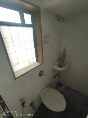 Bathroom in 1 BHK Apartment at Kanchan Pushp Society, Ghodbunder Road – for Rent