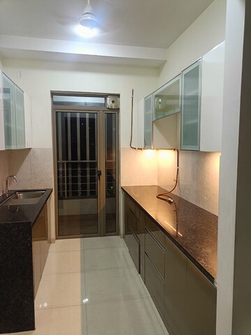 Kitchen in 2 BHK Apartment at Kalpataru Paramount, Kapur Bawdi – for Rent