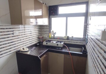 Kitchen in 1 BHK Apartment at JVM Aroma, Kasarvadavali – for Rent