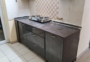 Kitchen in 2.5 BHK Apartment at Amrapali Princely Estate, Sector 76 – for Rent