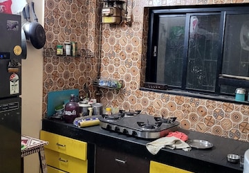Kitchen in 2 BHK Apartment at Anand CHS, Sion East – for Sale