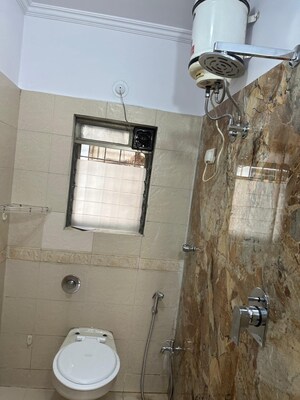 Bathroom in 2 BHK Apartment at Cosmos Tower, Panchsheel Nagar – for Rent