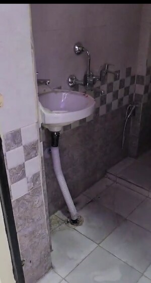 Bathroom in 1 BHK Apartment at GNDA Flats, Zeta I Greater Noida – for Rent