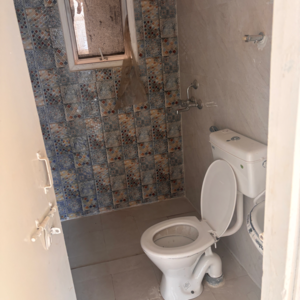 Bathroom in 2 BHK Apartment at Signature The Millennia 2, Garoli Kalan – for Sale
