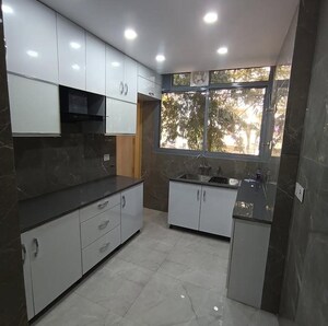 Kitchen in 3 BHK Apartment at Chattarpur – for Sale