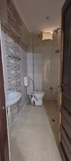 Bathroom in 2 BHK Builder Floor at Chattarpur – for Rent