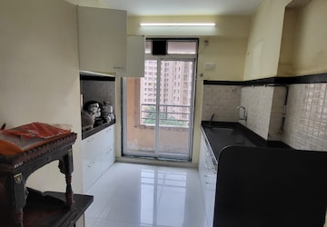 Kitchen in 2 BHK Apartment at Mahavir Kalpavruksha, Ghodbunder Road – for Rent