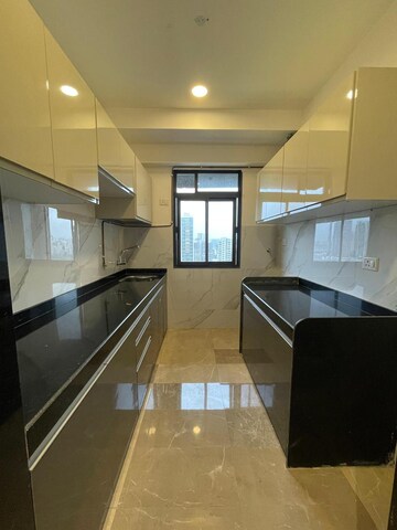 Kitchen in 2 BHK Apartment at Dev Leo Tower, Oshiwara – for Sale