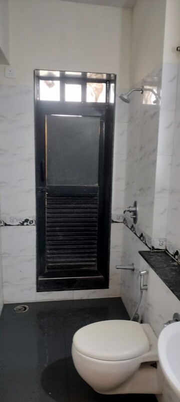 Bathroom in 1 BHK Apartment at K Raheja Raheja Residency, Malad East – for Rent