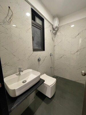 Bathroom in 2 BHK Apartment at Dev Leo Tower, Oshiwara – for Sale