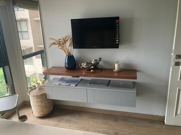 Living Room in 1 BHK Apartment at Hiranandani Regent Hill, Powai – for Rent