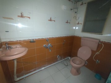Bathroom in 3 BHK Apartment at Kohinoor Courtyard One, Wakad – for Rent