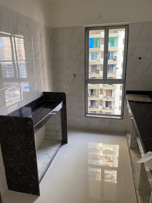 Kitchen in 1 BHK Apartment at Dharti Pressidio, Kandivali West – for Rent