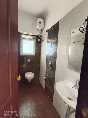 Bathroom in 1 BHK Apartment at Cosmos Enclave, Kasarvadavali – for Rent