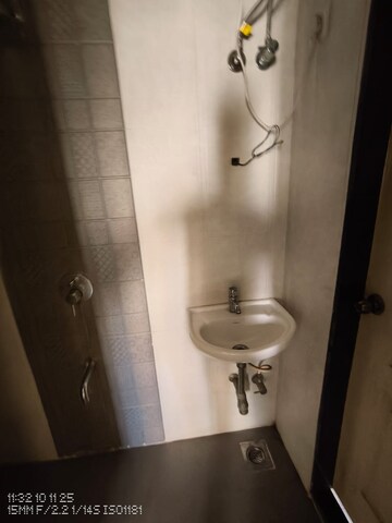 Bathroom in 1 BHK Apartment at Cosmos Enclave, Kasarvadavali – for Rent