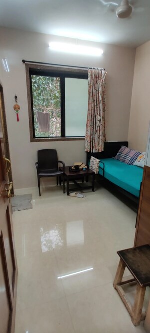 Living Room in 2 BHK Apartment at Kartar Bhavan, Colaba – for Rent