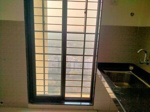 Room in 2 BHK Apartment at Acme Avenue, Kandivali West – for Rent