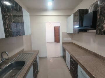 Kitchen in 3 BHK Apartment at Emaar Emerald Estate, Sector 65 – for Rent