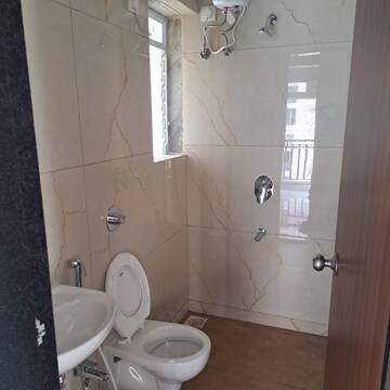 Bathroom in 1 BHK Apartment at Raunak Bliss, Ghodbunder Road – for Rent
