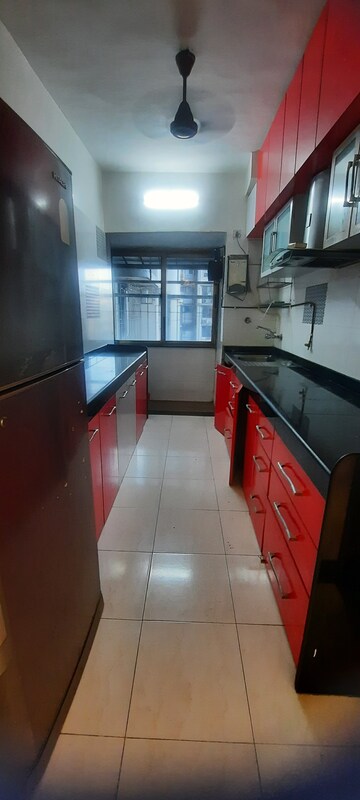 Kitchen in 2 BHK Apartment at Blue Mountain Towers, Shashtri Nagar – for Sale