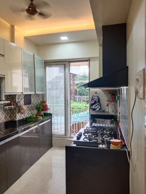 Kitchen in 1 BHK Apartment at Shree Tirupati STG Signature Residency, Patlipada – for Rent