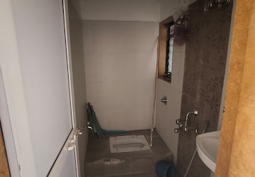 Bathroom in 2 BHK Apartment at Puranik Hometown, Ghodbunder Road – for Rent