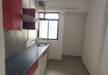 Kitchen in 2 BHK Apartment at Puranik Hometown, Ghodbunder Road – for Rent