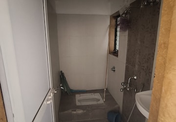Bathroom in 2 BHK Apartment at Puranik Hometown, Ghodbunder Road – for Rent