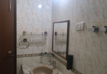 Bathroom in 3.5 BHK Apartment at ATS Green III, Sector 50 – for Rent