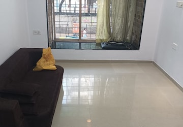 Living Room in 1 BHK Apartment at Bhoomi Park, Malad West – for Rent