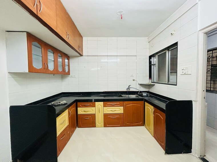 Kitchen, sun-empire 2 Bedroom 900 Sq.Ft. Apartment In Sun City Pune 9341137