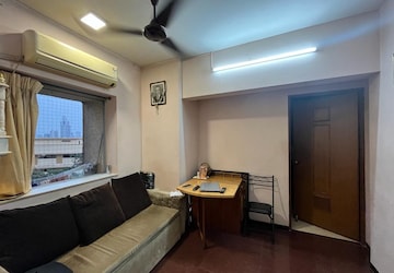 Living Room in 1 BHK Apartment at Lady Ratan Tower, Worli – for Rent