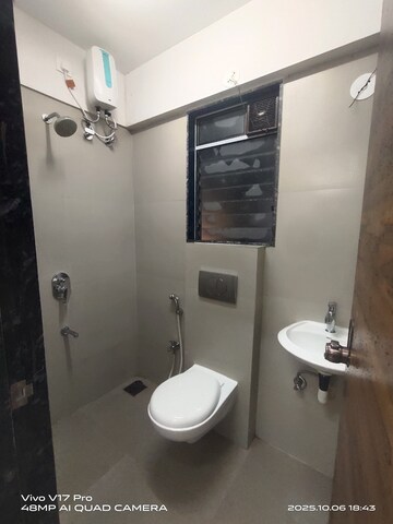 Bathroom in 1 BHK Apartment at Je And Vee Om Trimurti, Malad East – for Rent