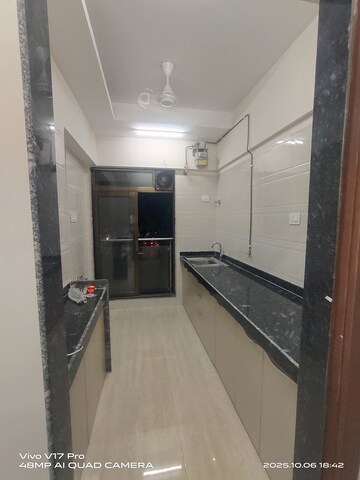 Kitchen in 1 BHK Apartment at Je And Vee Om Trimurti, Malad East – for Rent