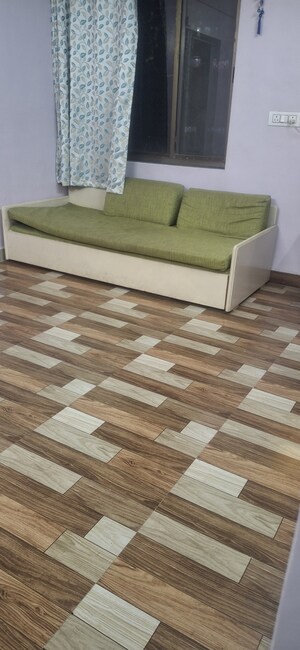 Living Room in 1 BHK Apartment at Megh Malhar Co-op Housing Society, Ghansoli – for Rent