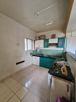 Kitchen in 2 BHK Apartment at Karan Ashiyana, Wadgaon Sheri – for Rent